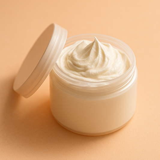 Jar of white body butter with a beige lid on a beige background